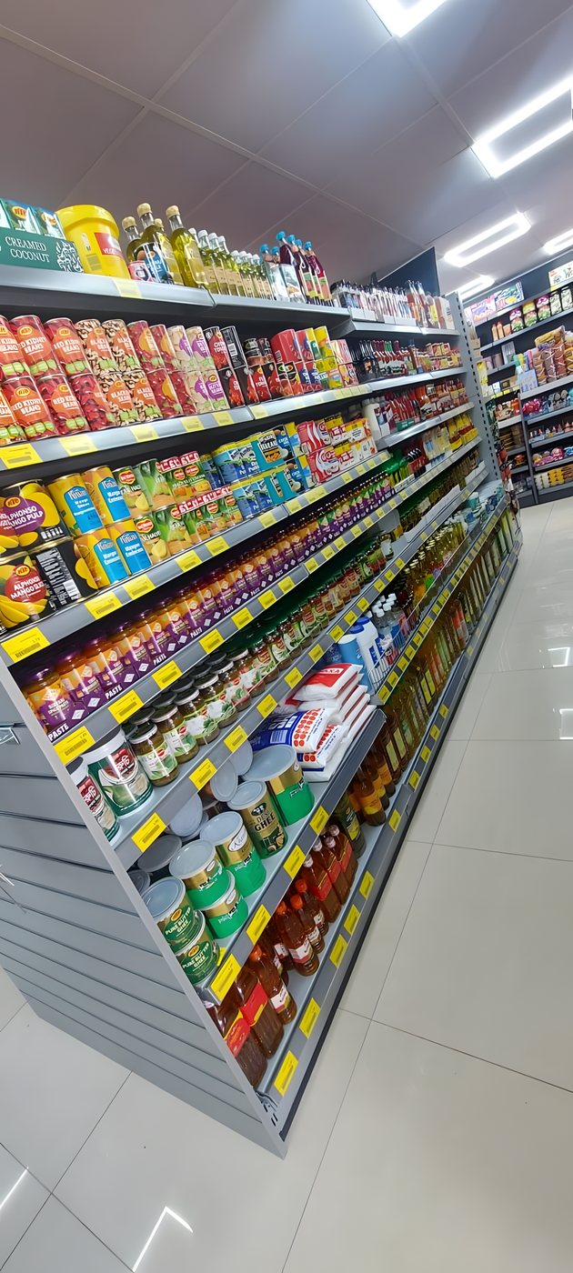 Shelves of canned goods, pulses and cooking oils